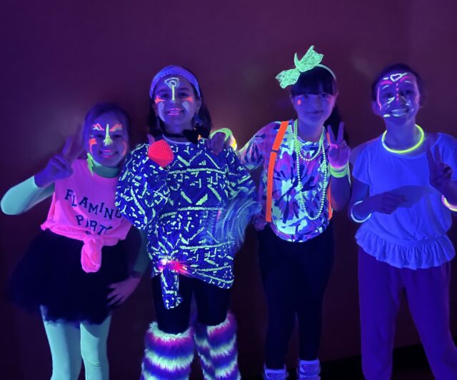 Kids having fun at a neon glow party