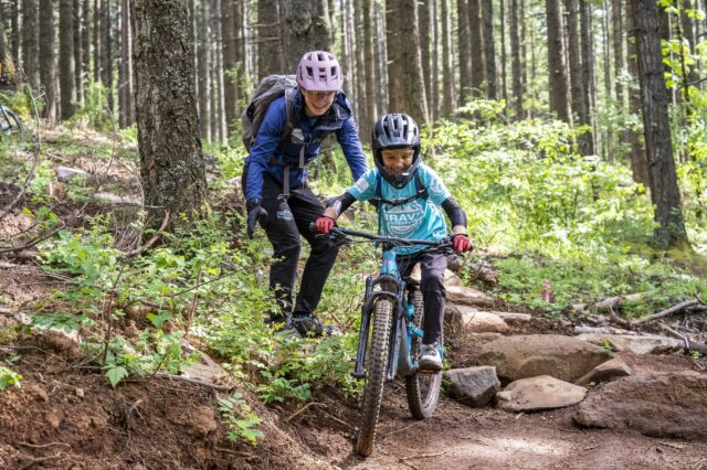 A parent and child mountain biking in the Gorge area